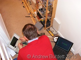 LAPTOP_Dad transfers software from the old controller to the newer one.