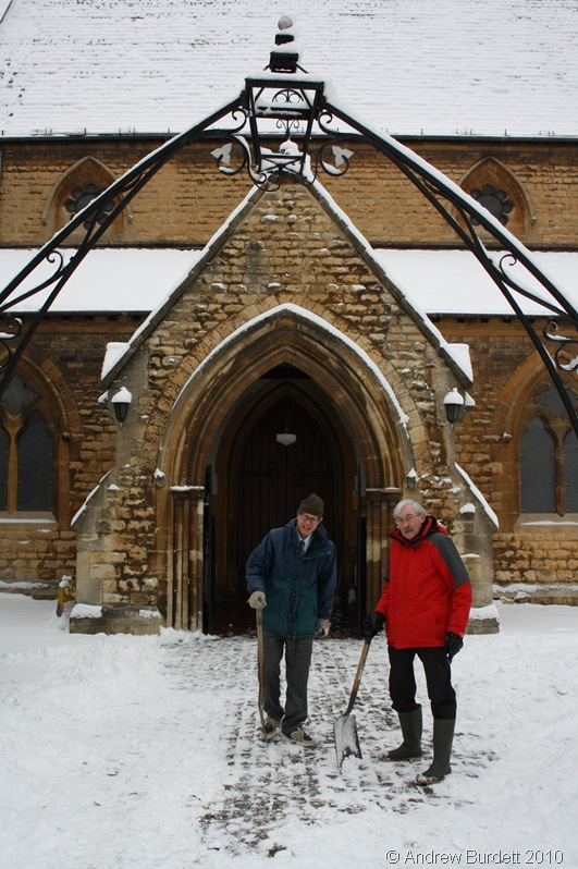 MEN AT WORK_Peter Goford and Don Luff, both members of St Luke's Church in Maidenhead, work hard to clear snow outside the porch.