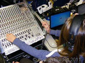 MIC CHECK_A 'techie' operates the sound desk.
