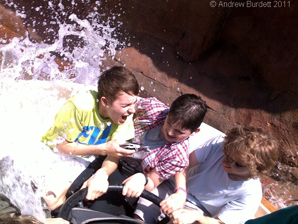 SPLASH DOWN_Jay Bricknell, Josh Raffles, and Ben de Souza get a soaking on the Grand Canyon Rapids ride, during Wednesday's theme-park visit.
