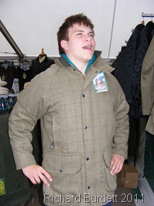 WHAT WHAT_Trying a tweed jacket for size.