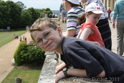 MY HOUSE AND HOME_Matthew, ten, on the balcony at Cliveden house.