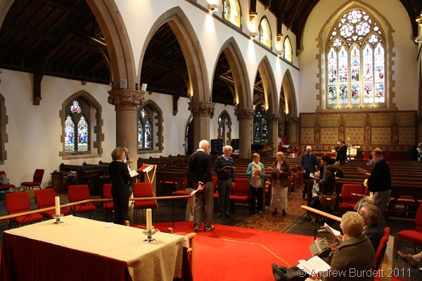 TAKE YOUR PLACES_Preparing for the service, the members of the clergy and churchwardens assist with the rehearsal.