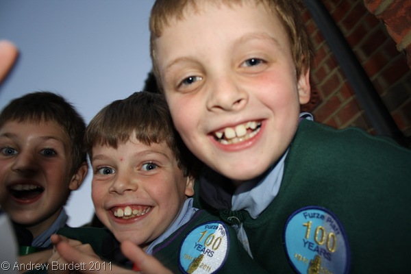 SMILING FACES_Furze Platt Cubs, with their centenary badges on their jumpers.