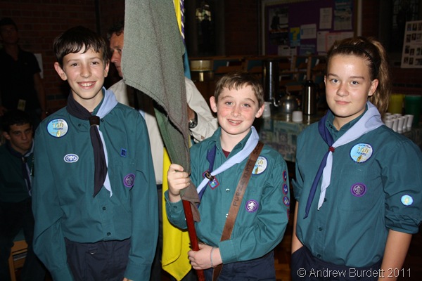DOING THEIR DUTY_Three Scouts carried the flags up at the start of the service.