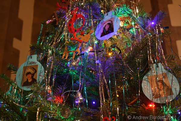 FACE OF CHRISTMAS_Sparklers members' faces on one of the Youth Church trees.