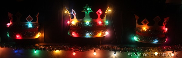 CROWNING GLORY: Three crowns, each illuminated with fairy lights, hang on the wall. (IMG_1543)