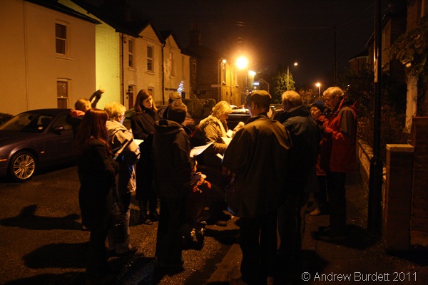 HUDDLED ROUND A LAMPOST_After leaving Neve House, we sang carols in the neighbouring streets.