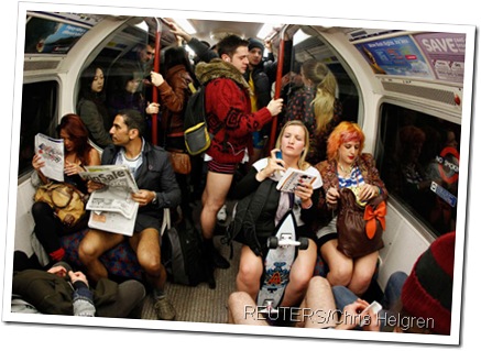 KNICKERS IN A TWIST: Londoners travelling on the tube wearing no trousers.