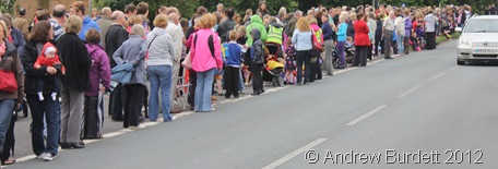ROADBLOCK: People blocked the entrance to Cranbrook Drive in a bid to get as close to the approaching Torch as possible. (IMG_8742_ARB)