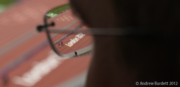 EYES OF THE WORLD: Matthew, my brother, looks down at the track of the London 2012 Olympic Stadium. (IMG_2596)