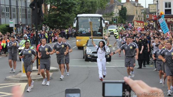 TIME TO SHINE: One of the last Torchbearers of the day runs her stint. (IMG_8523/OXFORD)