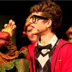 PUPPET SHOW: Seymour (Mark Janes) with the little version of the Audrey II. (IMG_3474_AlexMeade)