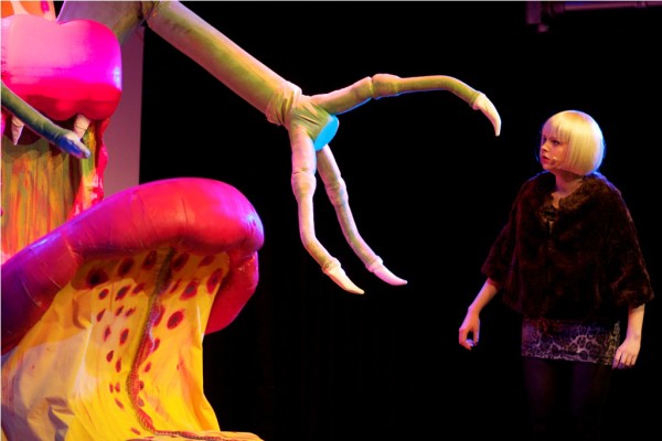 CLAWING THEM IN: Tilly Mitchell as Audrey comes face-to-face with the terrifying Audrey II. (IMG_3904_AlexMeade)