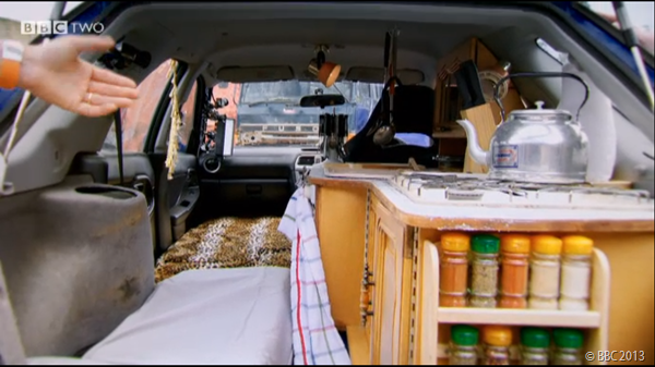 RICHARD'S MODIFIED CAR: Complete with kitchen and leopard-print bed.
