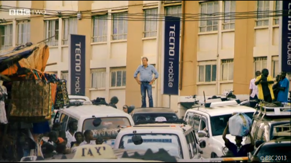 STANDING TALL: Jeremy Clarkson inspects the traffic he and his colleagues must pass through.