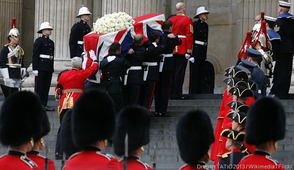 UP SHE GOES: Margaret Thatcher's Union-Flag-draped coffin enters St Paul's.