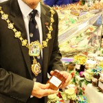 RBWM Mayor Andrew Jenner with produce at St Luke's stall.