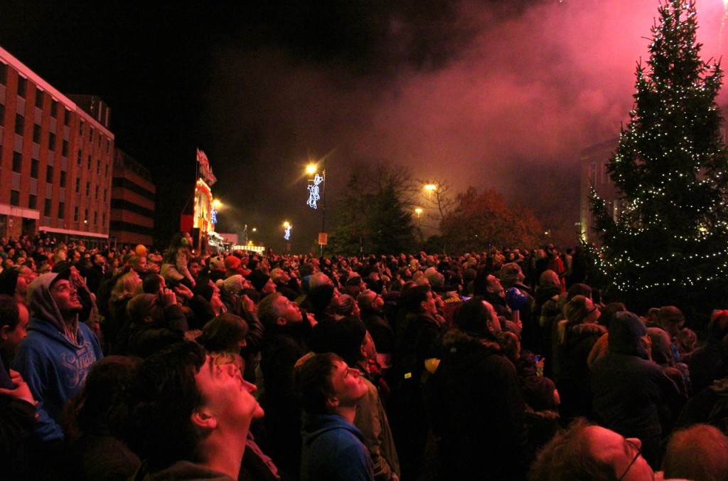 A crowd of thousands looks up at the fireworks from St Ives Road.