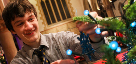 Matt Price helps decorate the Taplow Youth Choir Christmas tree