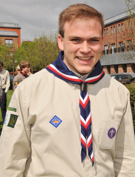 Andrew Burdett in Scout uniform with, on right breast, his Queen's Scout badge.