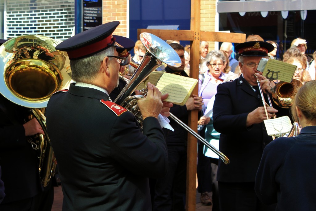Musicians from the Salvation Army accompany the crowd's singing.