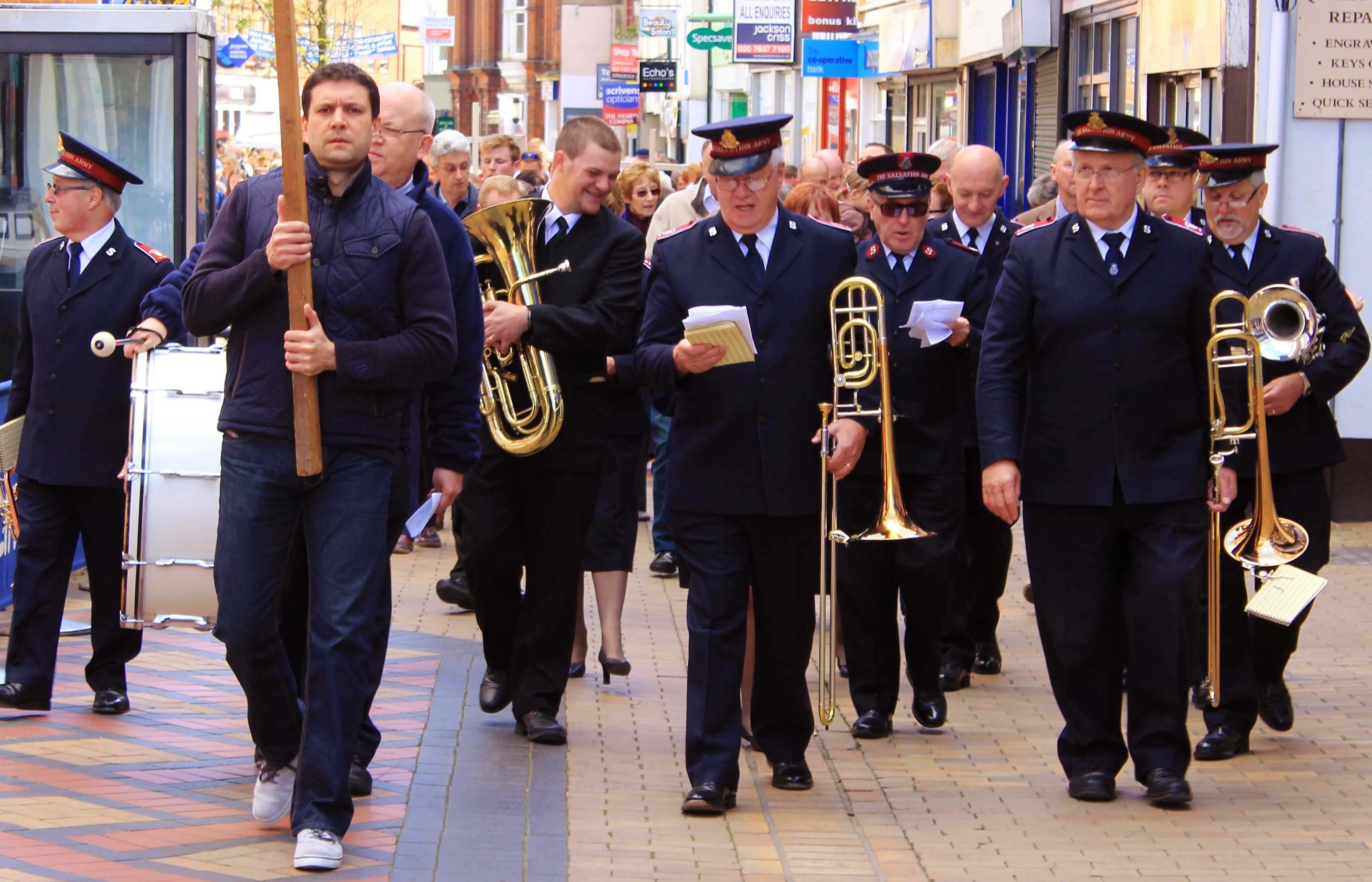 Walking up Maidenhead High Street, the Salvation Army lead the Walk of Witness procession.