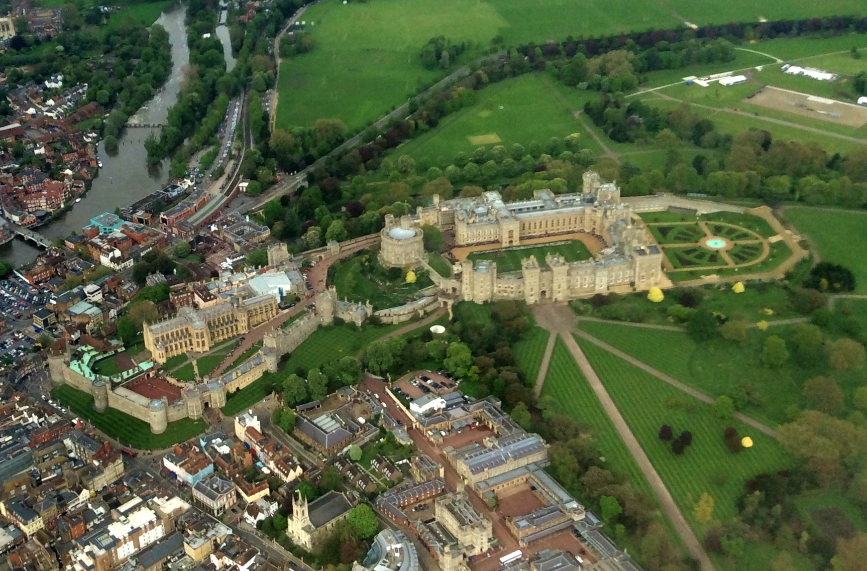 The Queens Scout Award ceremony, seen from the Heathrow flight-path. Observe the tiny row of uniformed Scouts standing on the grass within the Castle's walls.