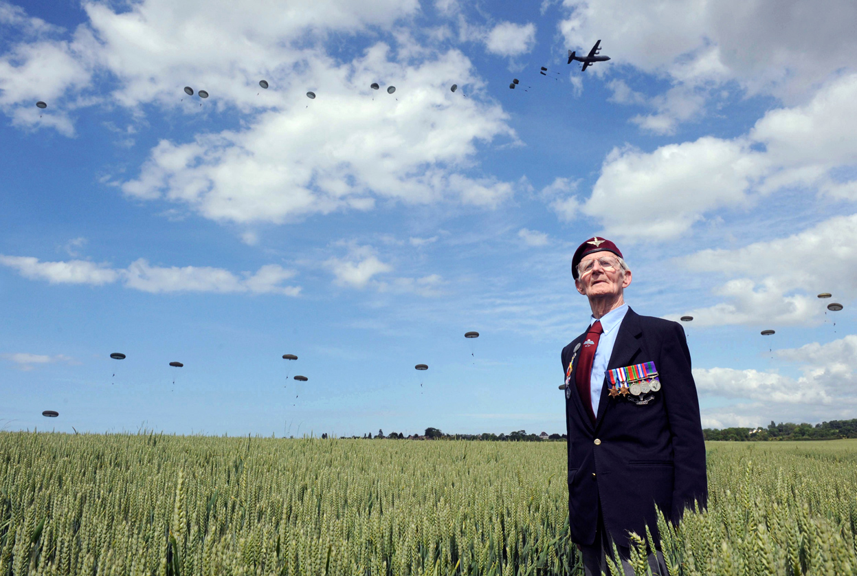 Frererick Glover, a D-Day veteran, looks out over the fields of Western France.