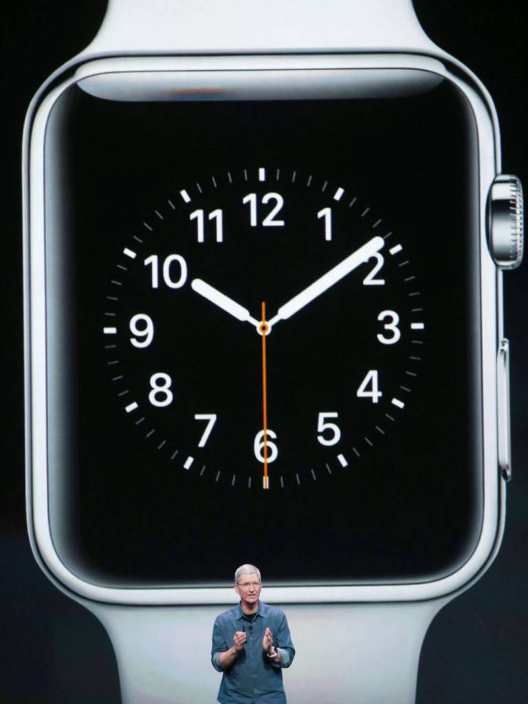 Tim Cook revealing the Apple Watch at a press conference in California.