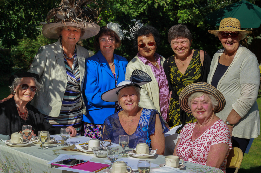 Women from St Luke's enjoying the summer sunshine in the vicarage garden.