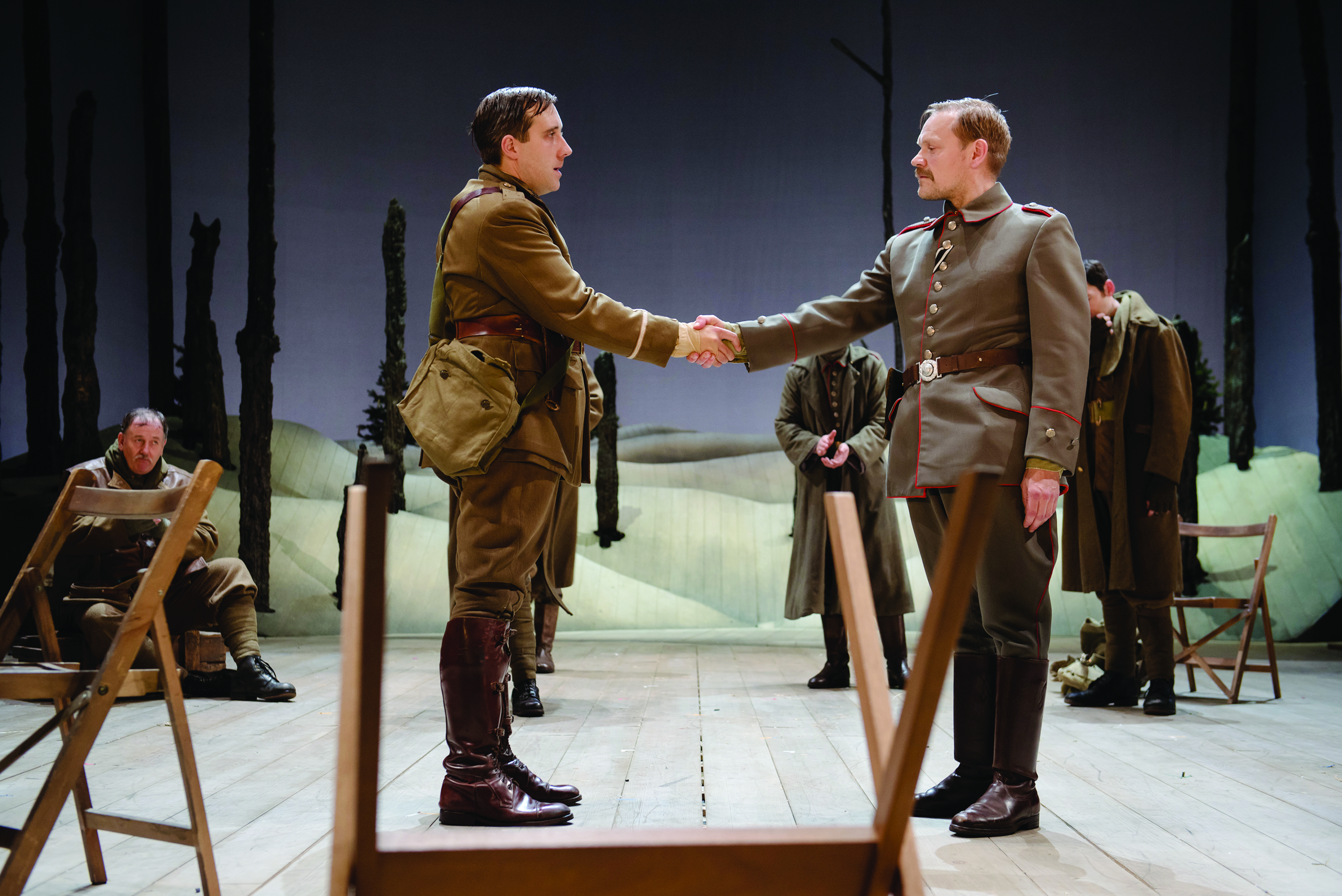 Bruce Bairnsfather (Joseph Kloska) finally agrees to shake the hand of his enemy, Leutnant Kohler (Nick Haverson) in 'The Christmas Truce'. [PHOTO: Topher McGrillis]