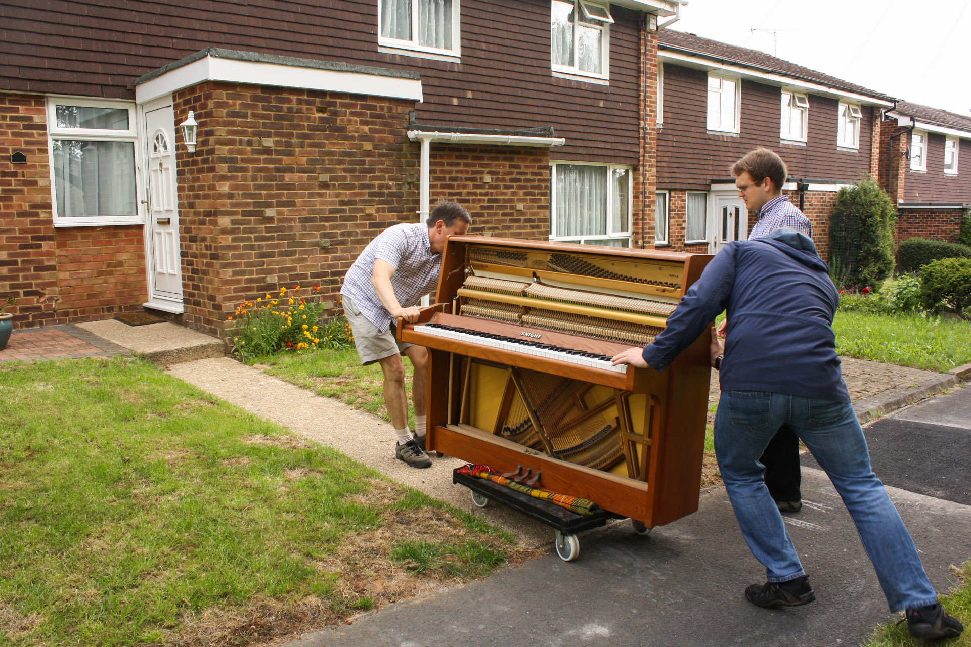 Manouevering the piano over his threshold, it took just two minutes to wheel the piano along the footpaths of Matthew's estate.