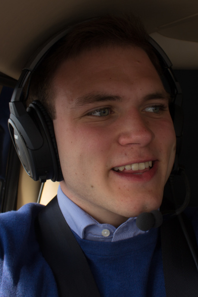 Andrew Burdett pictured in the helicopter during the flight experience.