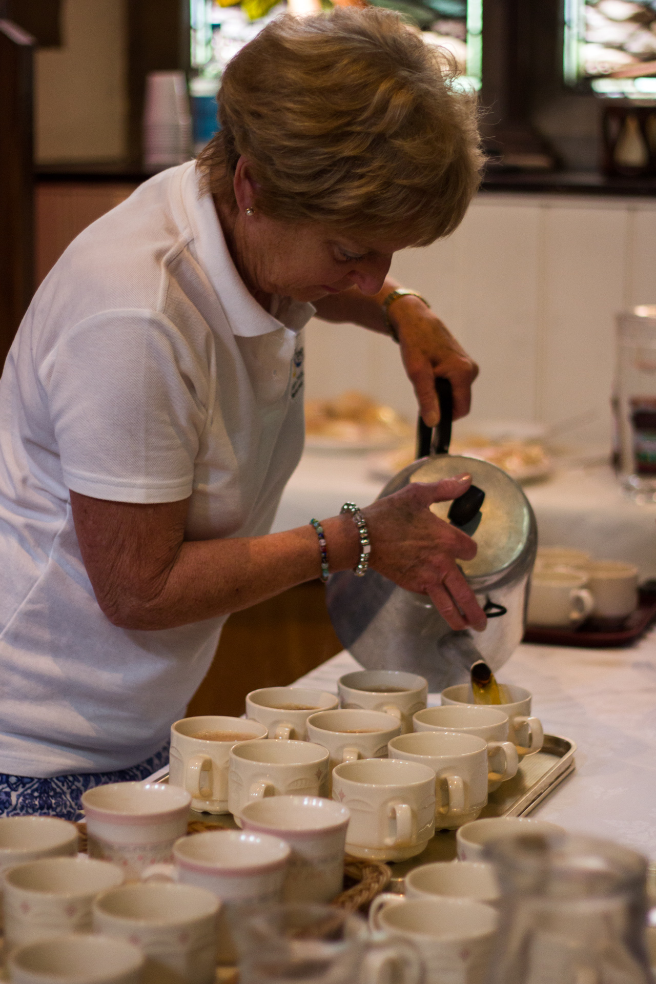 Doing a sterling job, Sally Somerville poured tea for audience-members to enjoy.